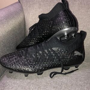 Puma outdoor cleats.